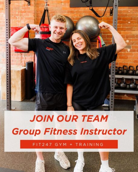 Group fitness instructor team at Fit247 Gym Bentleigh East. Smiling man and woman flexing in fitness center. Join our team!
